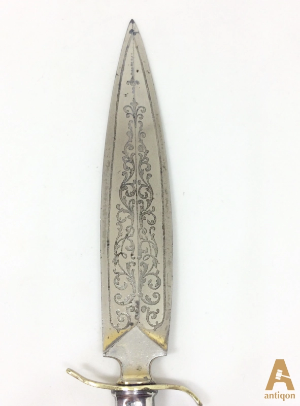 Silver knife for letters.