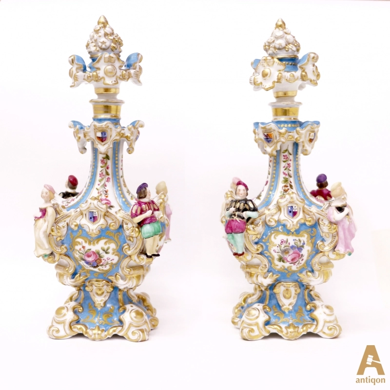 A pair of perfume flacon