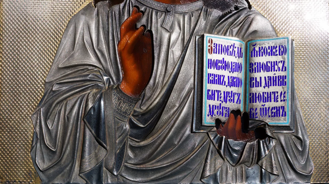An ancient image of the Savior in an exquisite silver setting with enamel. Russia, Moscow, 1890. 