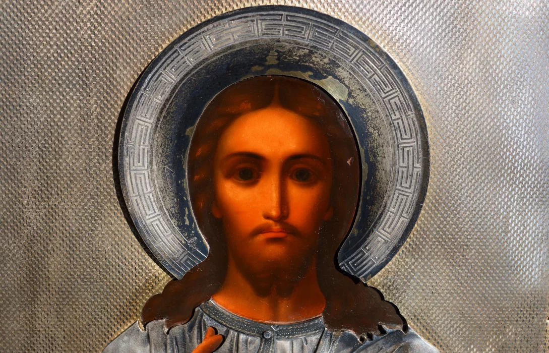 An ancient image of the Savior in an exquisite silver setting with enamel. Russia, Moscow, 1890. 