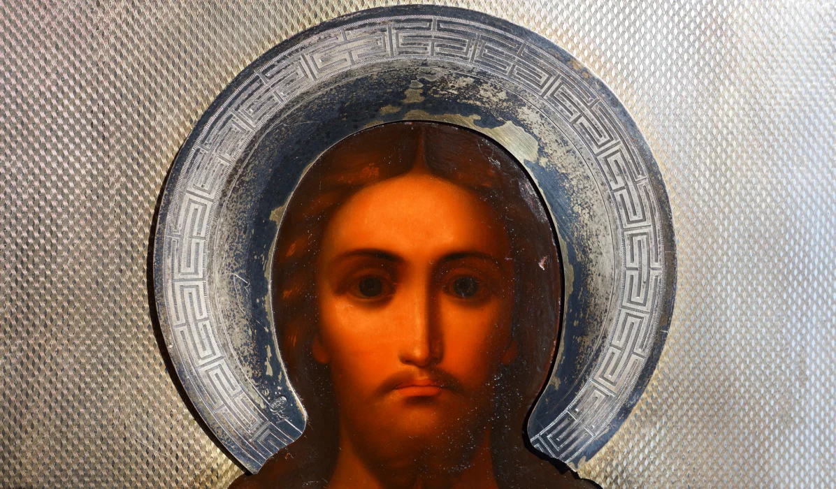 An ancient image of the Savior in an exquisite silver setting with enamel. Russia, Moscow, 1890. 