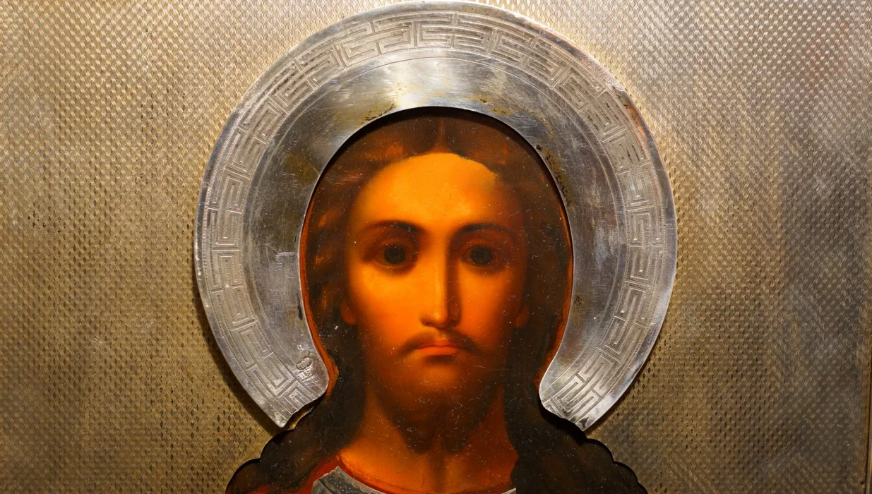 An ancient image of the Savior in an exquisite silver setting with enamel. Russia, Moscow, 1890. 