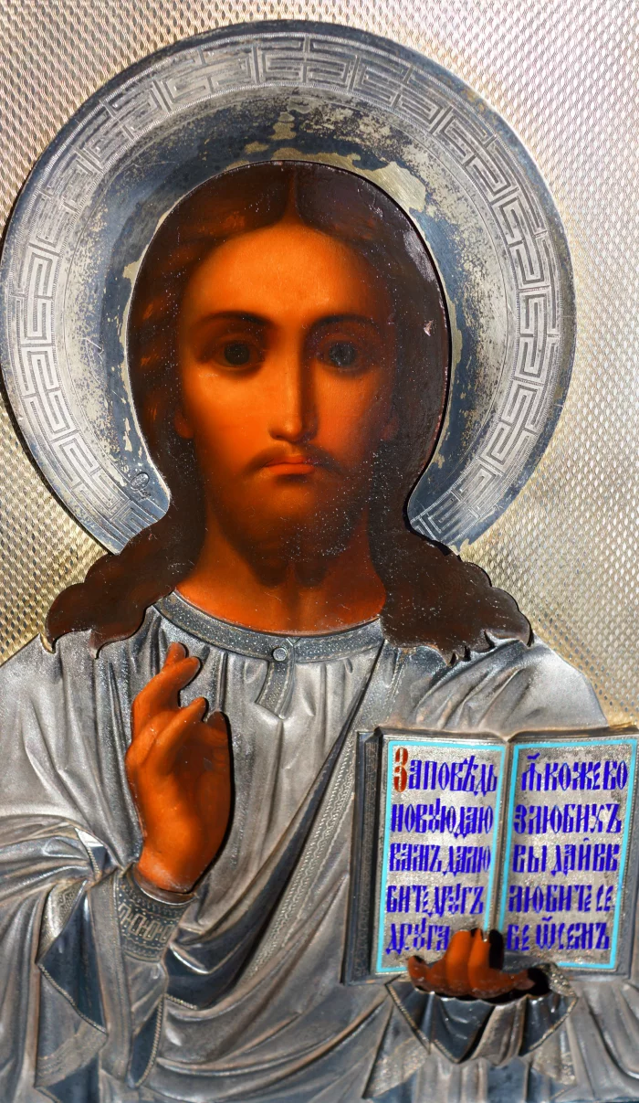 An ancient image of the Savior in an exquisite silver setting with enamel. Russia, Moscow, 1890. 