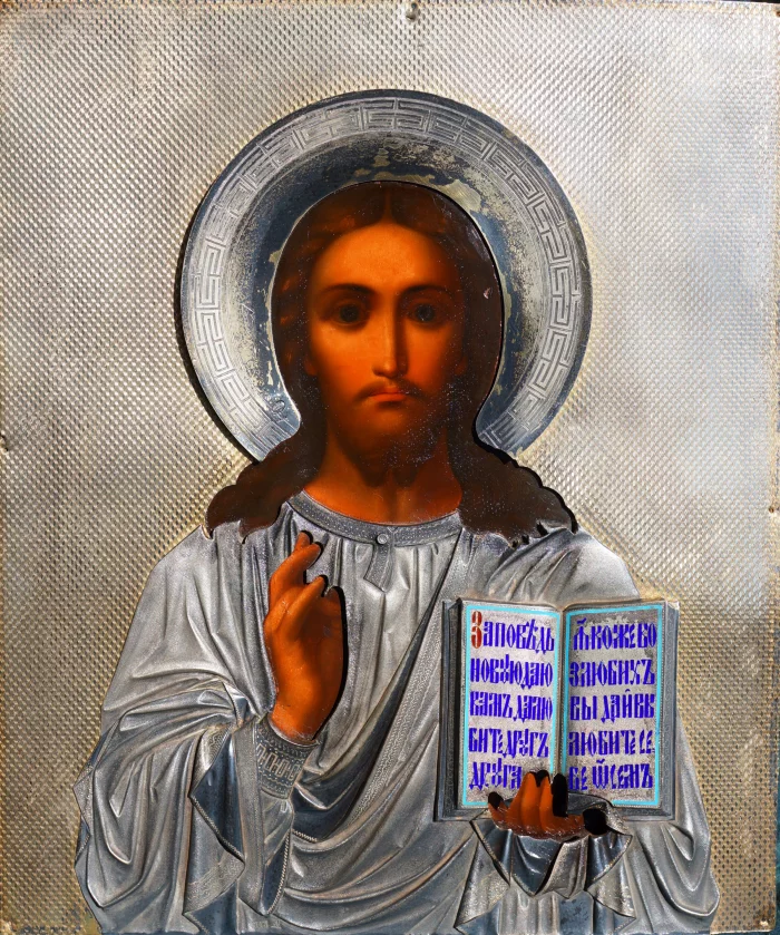An ancient image of the Savior in an exquisite silver setting with enamel. Russia, Moscow, 1890. 