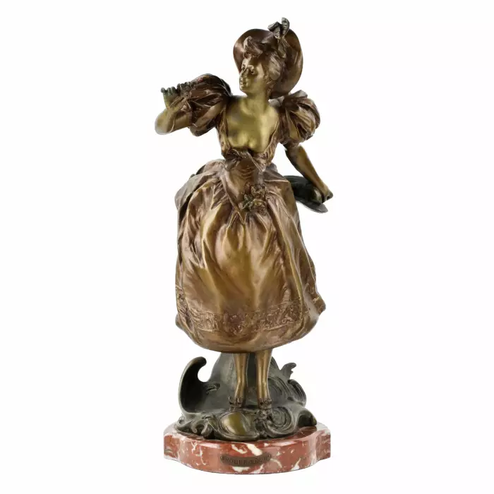 Figurine française en metal bronze sur socle en marbre. Joyeuses vacances. 