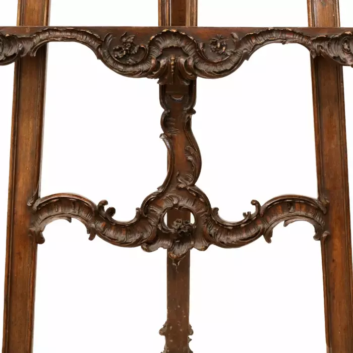 Carved, wooden easel of the turn of the 19th-20th centuries in neo-rococo style. 