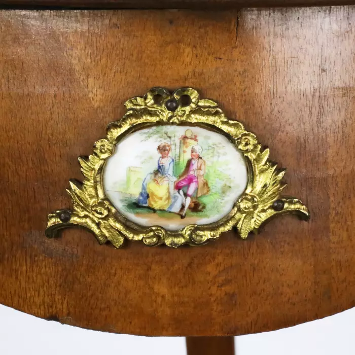 Console table with porcelain medallions and brass-bronze decor, third rococo style. 