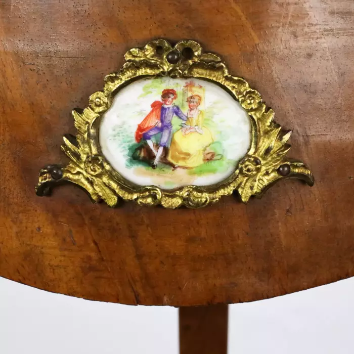 Console table with porcelain medallions and brass-bronze decor, third rococo style. 