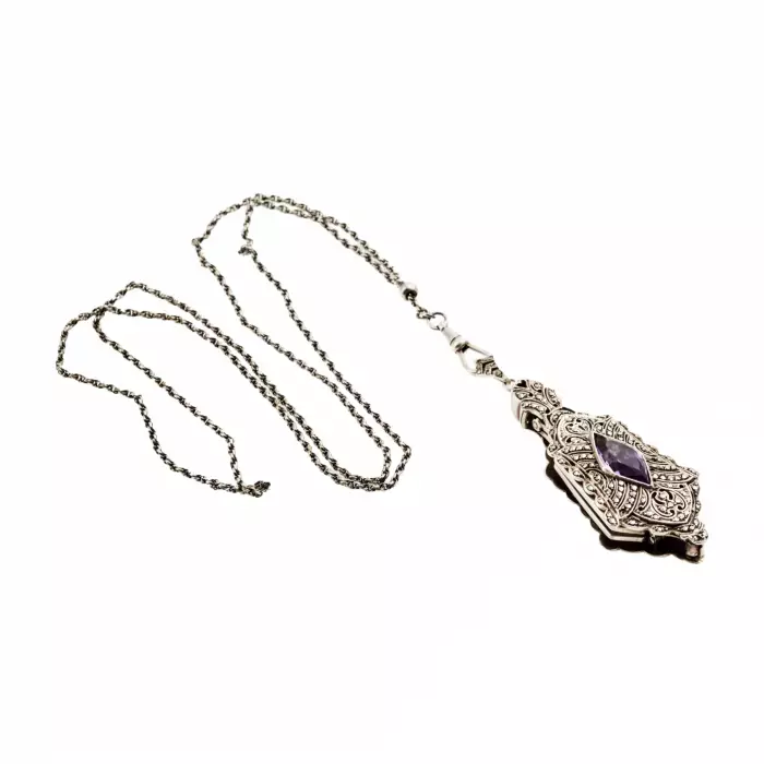 Pendentif lorgnette en argent sur chaîne Platinin. 