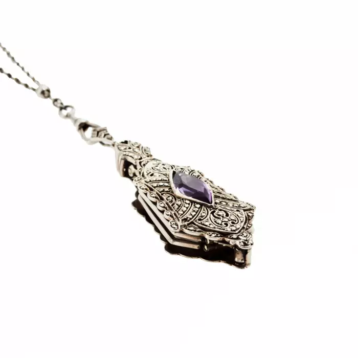 Pendentif lorgnette en argent sur chaîne Platinin. 