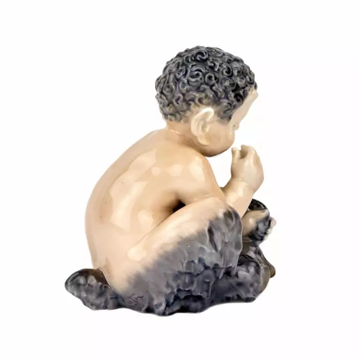Figurine Faune avec un serpent. Royal Copenhague. 