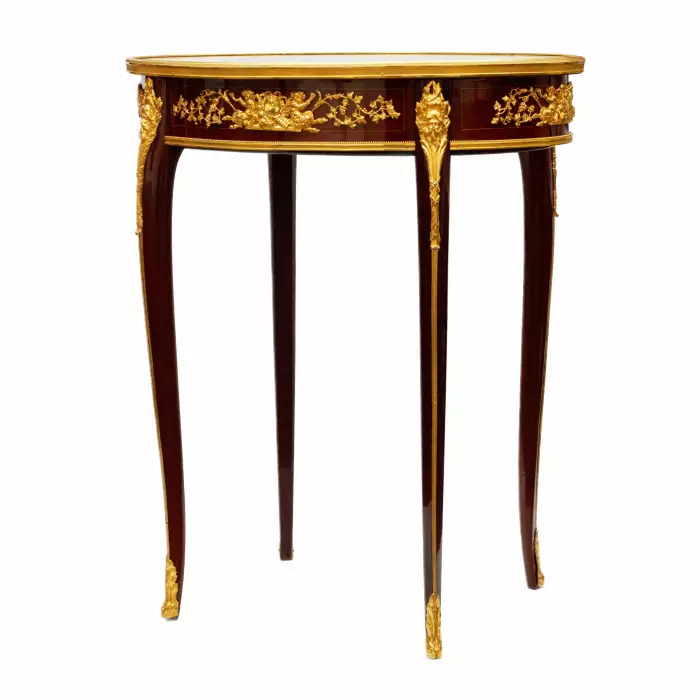 Magnifique table en acajou et bronze dore de François Linke. 