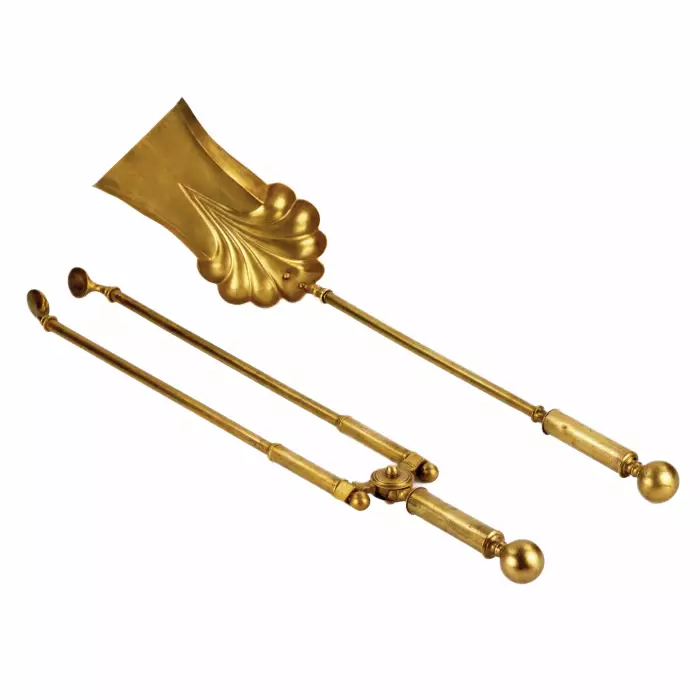 Brass set for a fireplace in the style of historicism. 19-20th centuries. 