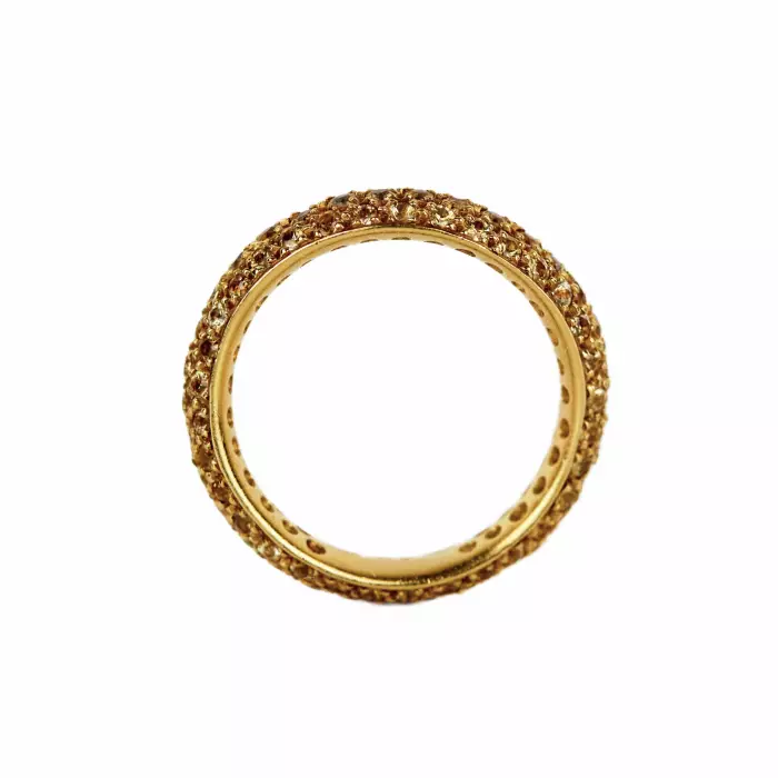 Bague en or jaune 18 K. Pomellato, avec anneau Wave en saphir jaune. 