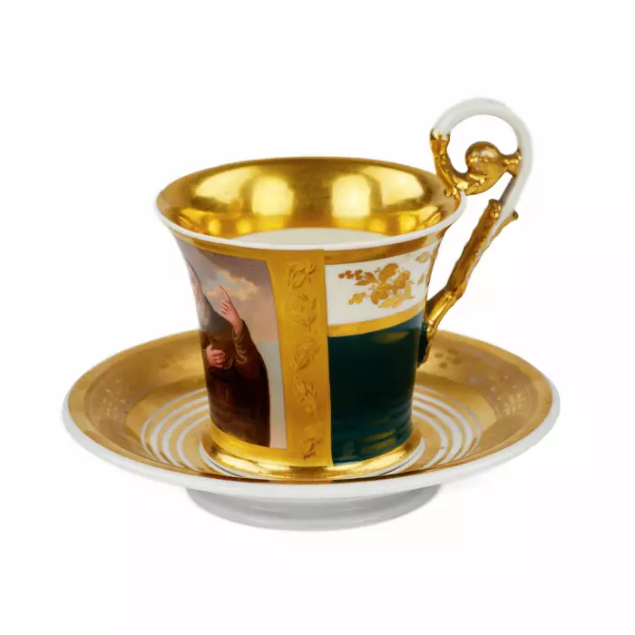 Tasse et soucoupe peintes de la periode Biedermeier. 