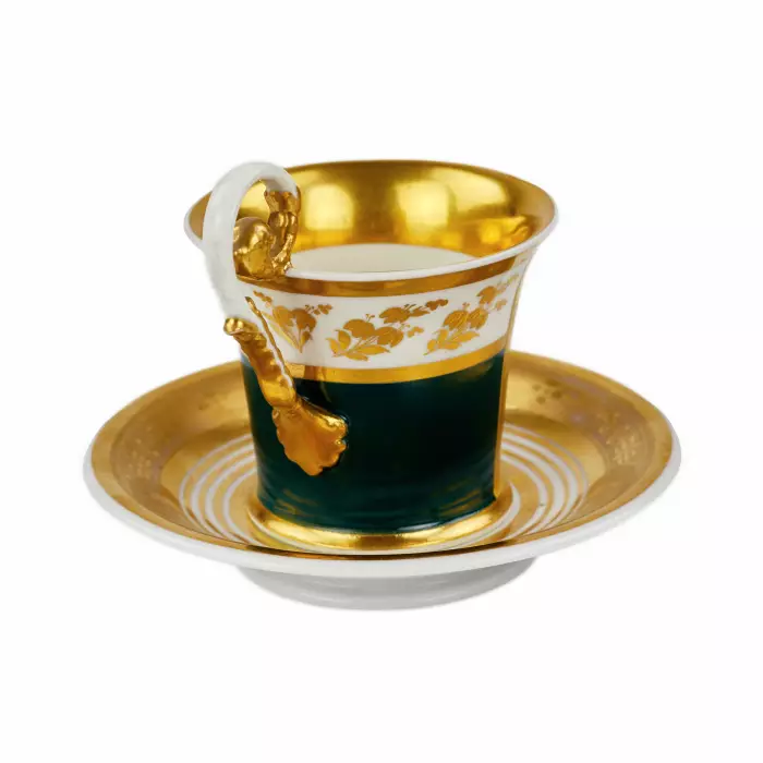 Tasse et soucoupe peintes de la periode Biedermeier. 