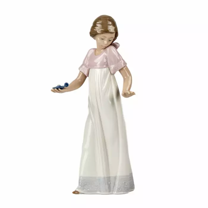 Cute figurine of a young lady with a burnt candle. Ladro, 1991 
