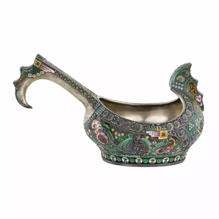 A graceful silver kovsh in the Russian Art Nouveau style of the 11th Moscow artel. Early 20th century.