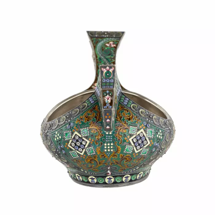 A graceful silver kovsh in the Russian Art Nouveau style of the 11th Moscow artel. Early 20th century.