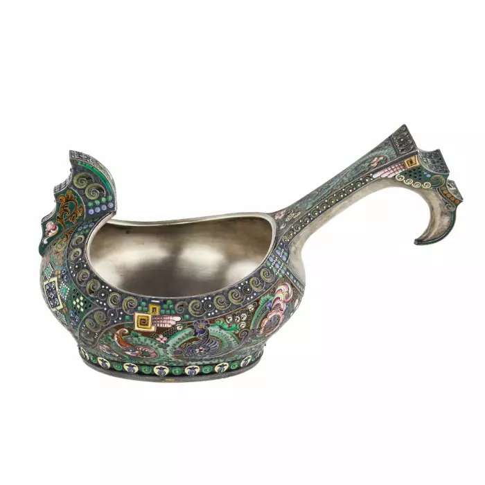 A graceful silver kovsh in the Russian Art Nouveau style of the 11th Moscow artel. Early 20th century.