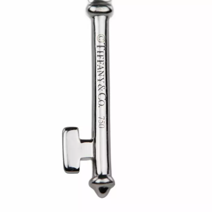 PENDENTIF TIFFANY cle en or blanc 18 carats avec diamant