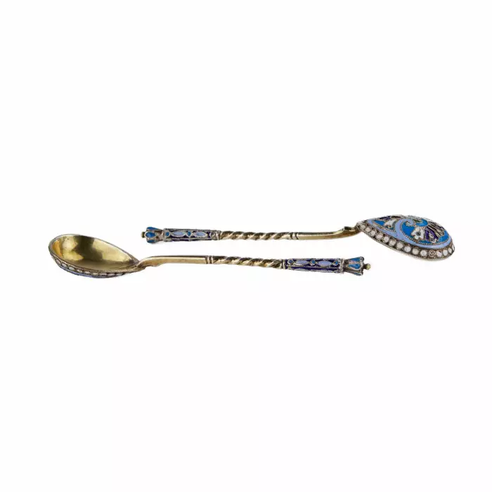 A pair of Russian silver spoons with enamel and gilding. The turn of the 19th-20th centuries.