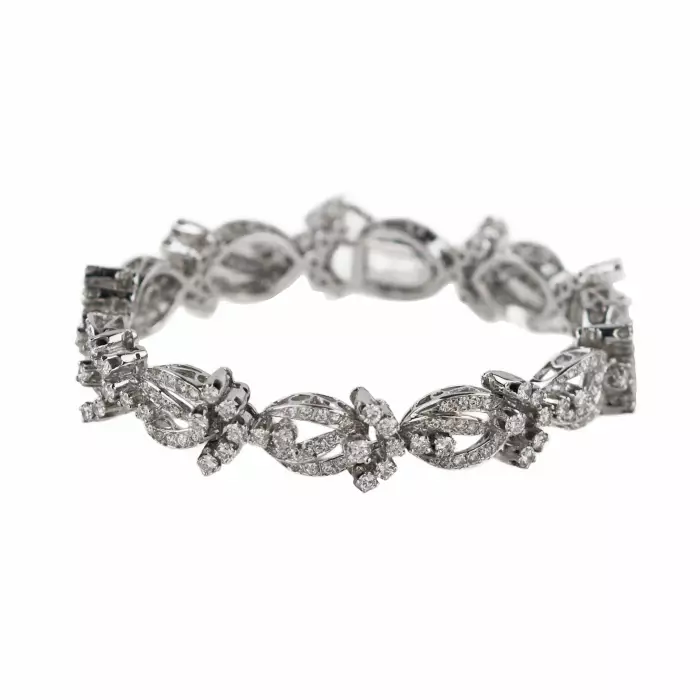 BRACELET IN 18 KARAT WHITE GOLD WITH DIAMOND FLORAL LINKS. 21ST CENTURY