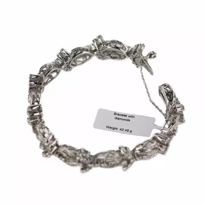 BRACELET IN 18 KARAT WHITE GOLD WITH DIAMOND FLORAL LINKS. 21ST CENTURY