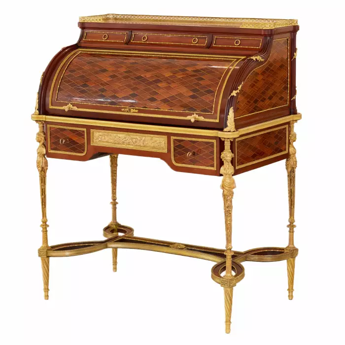 E.KAHN. Magnifique bureau cylindrique en acajou et bois satiné avec bronze doré. 