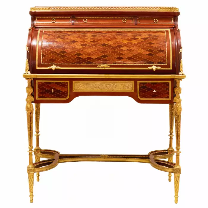 E.KAHN. Magnifique bureau cylindrique en acajou et bois satiné avec bronze doré. 