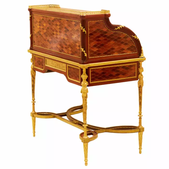 E.KAHN. Magnifique bureau cylindrique en acajou et bois satiné avec bronze doré. 