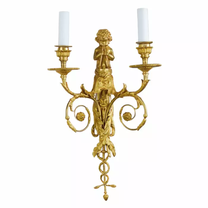 A PAIR OF FRENCH GILT-BRONZE TWO-LIGHT WALL APPLIQUES IN THE LOUIS XVI STYLE. AFTER A MODEL BY JEAN HAURÉ. FRANCE, SECOND HALF OF THE 19TH CENTURY
