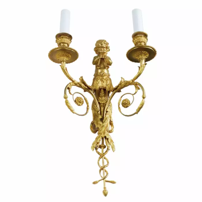 A PAIR OF FRENCH GILT-BRONZE TWO-LIGHT WALL APPLIQUES IN THE LOUIS XVI STYLE. AFTER A MODEL BY JEAN HAURÉ. FRANCE, SECOND HALF OF THE 19TH CENTURY
