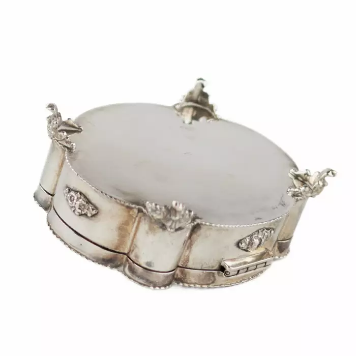 Italian, silver jewelry box of baroque shape. 20th century. 