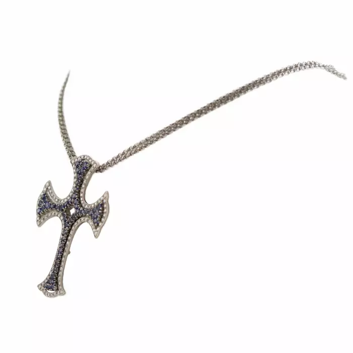  Croix en or blanc 18 carats, fabrication italienne, avec saphirs et diamants. 