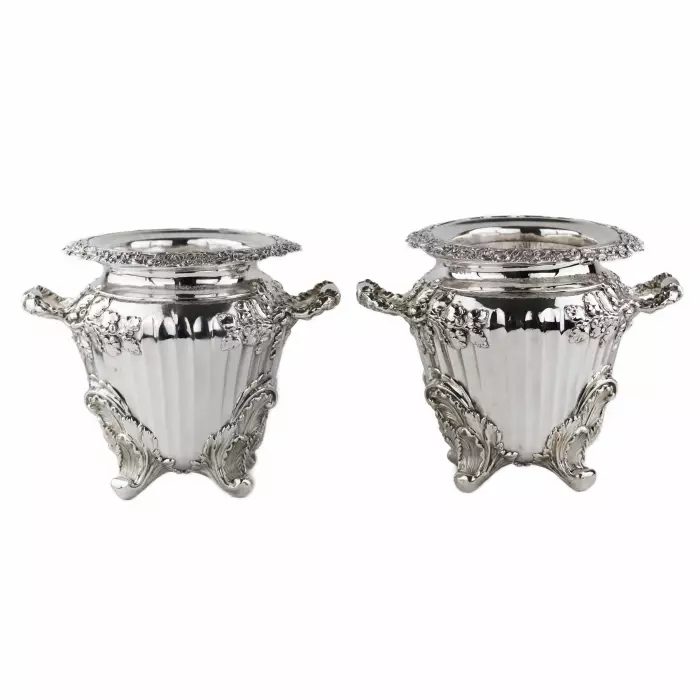Pair of large, embossed silver wine coolers. England. 1804 Stephen Adams. 