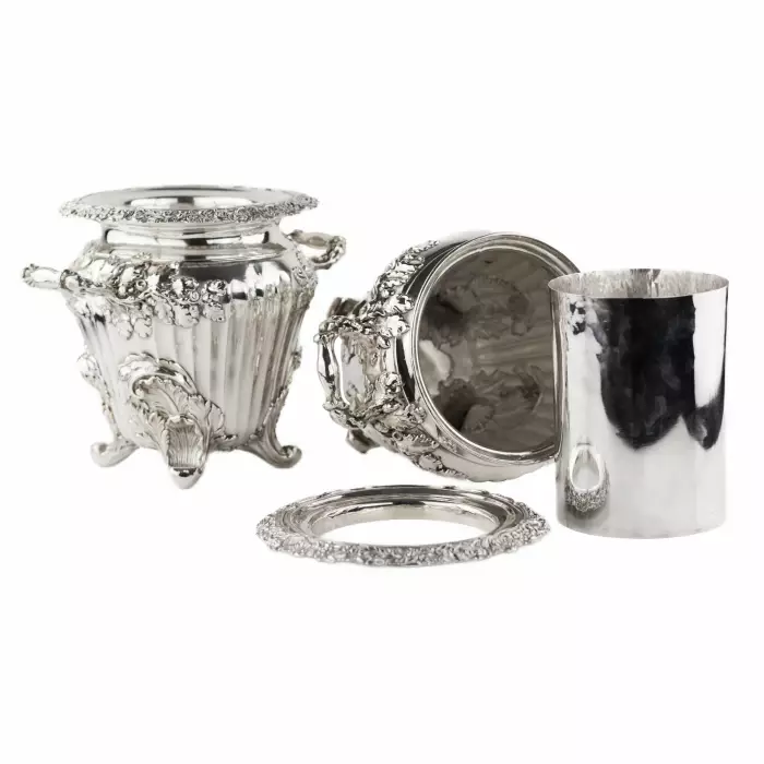 Pair of large, embossed silver wine coolers. England. 1804 Stephen Adams. 