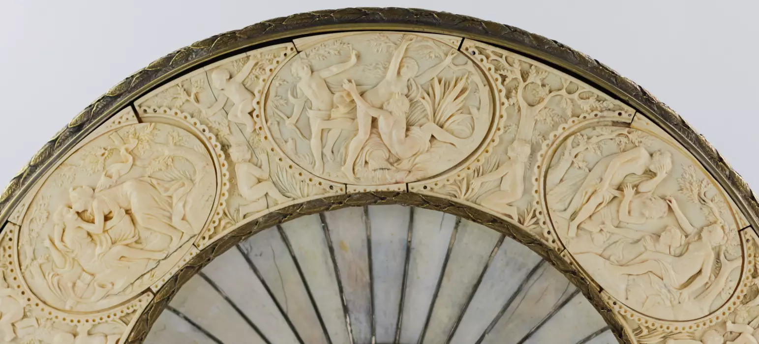 A magnificent neo-Renaissance Bacchus dish inlaid with ivory on wood in the manner of Johann Michael Maucher (1645-1701)