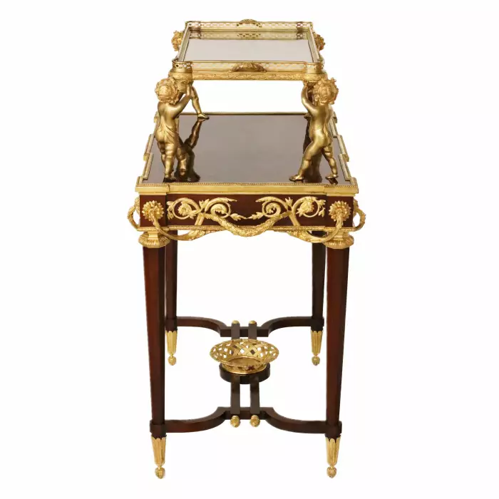 Two-tier tea table with attributes in the Louis XVI style, modeled by Francois Lincke. France, late 19th century 