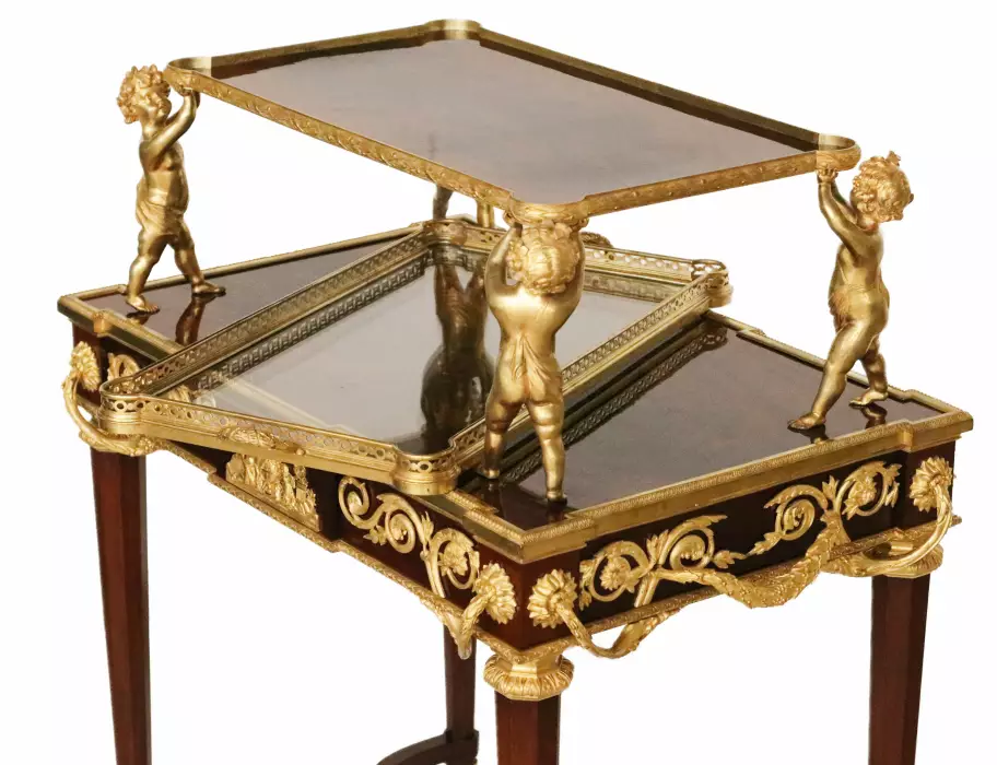 Two-tier tea table with attributes in the Louis XVI style, modeled by Francois Lincke. France, late 19th century 