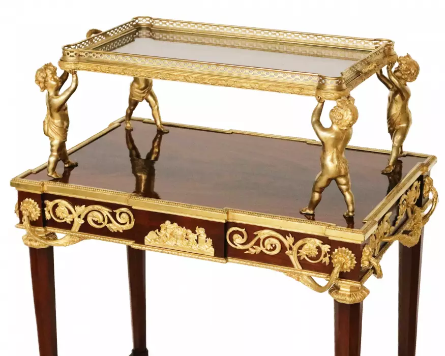 Two-tier tea table with attributes in the Louis XVI style, modeled by Francois Lincke. France, late 19th century 