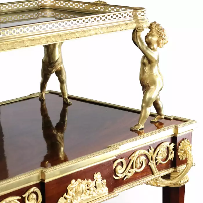 Two-tier tea table with attributes in the Louis XVI style, modeled by Francois Lincke. France, late 19th century 