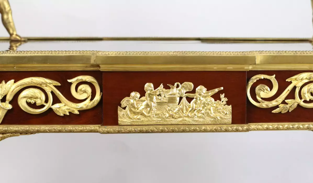 Two-tier tea table with attributes in the Louis XVI style, modeled by Francois Lincke. France, late 19th century 