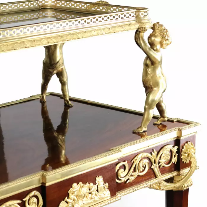 Two-tier tea table with attributes in the Louis XVI style, modeled by Francois Lincke. France, late 19th century 