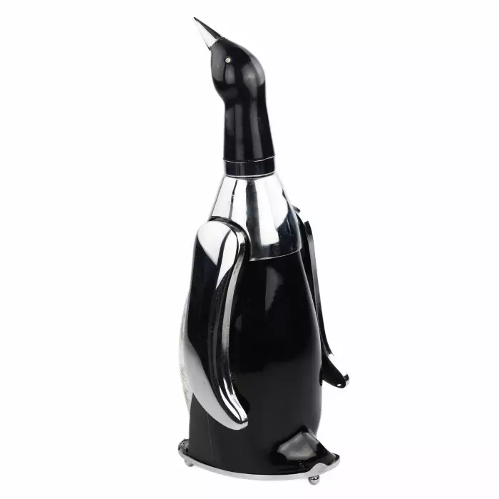 CARAFE EN FORME DE MANCHOT AVEC BOÎTE À MUSIQUE. JAPON. ANNÉES 1960