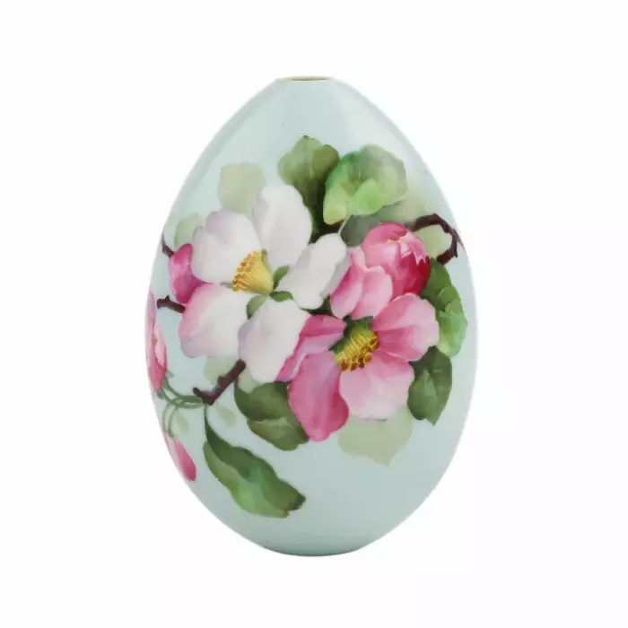 PORCELAIN EASTER EGG WITH HAND-PAINTED BLOSSOMING APPLE ORCHARD RUSSIA, LATE 19TH CENTURY (C. 1890–1900)