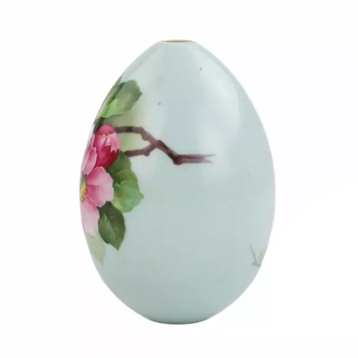 PORCELAIN EASTER EGG WITH HAND-PAINTED BLOSSOMING APPLE ORCHARD RUSSIA, LATE 19TH CENTURY (C. 1890–1900)
