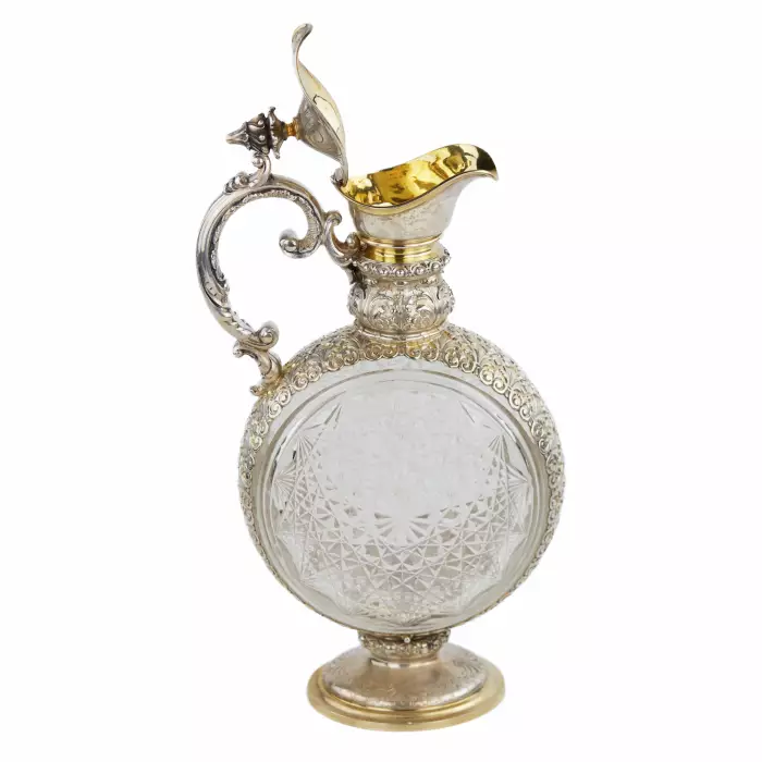 PAIR OF CUT CRYSTAL WINE EWERS WITH SILVER MOUNTS GERMANY, FIRST HALF OF THE 20TH CENTURY