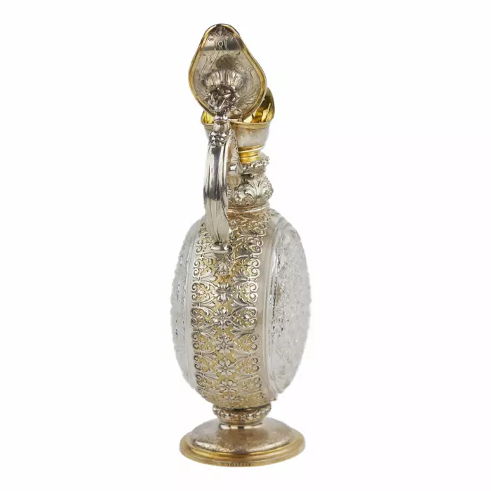 PAIR OF CUT CRYSTAL WINE EWERS WITH SILVER MOUNTS GERMANY, FIRST HALF OF THE 20TH CENTURY
