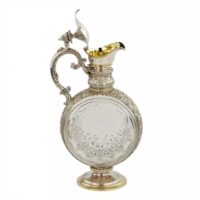 PAIR OF CUT CRYSTAL WINE EWERS WITH SILVER MOUNTS GERMANY, FIRST HALF OF THE 20TH CENTURY